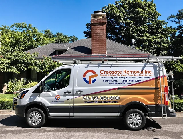 Westwood Chimney Sweep technician removing creosote safely in Westwood, MA