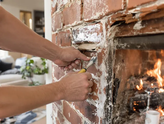 Routine fireplace repair by Westwood Chimney Sweep in Westwood, MA